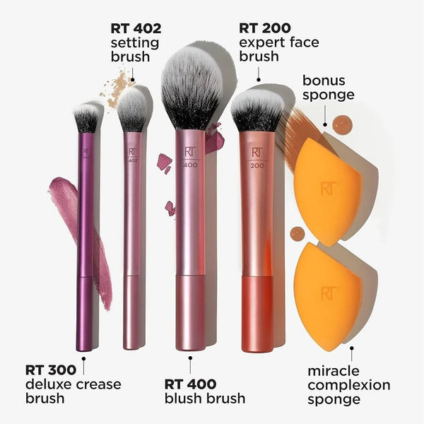 Six makeup brushes with soft black bristles and metallic handles; includes two orange sponges