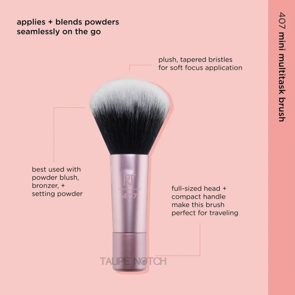 Mini multitask makeup brush with black bristles and rose-pink handle