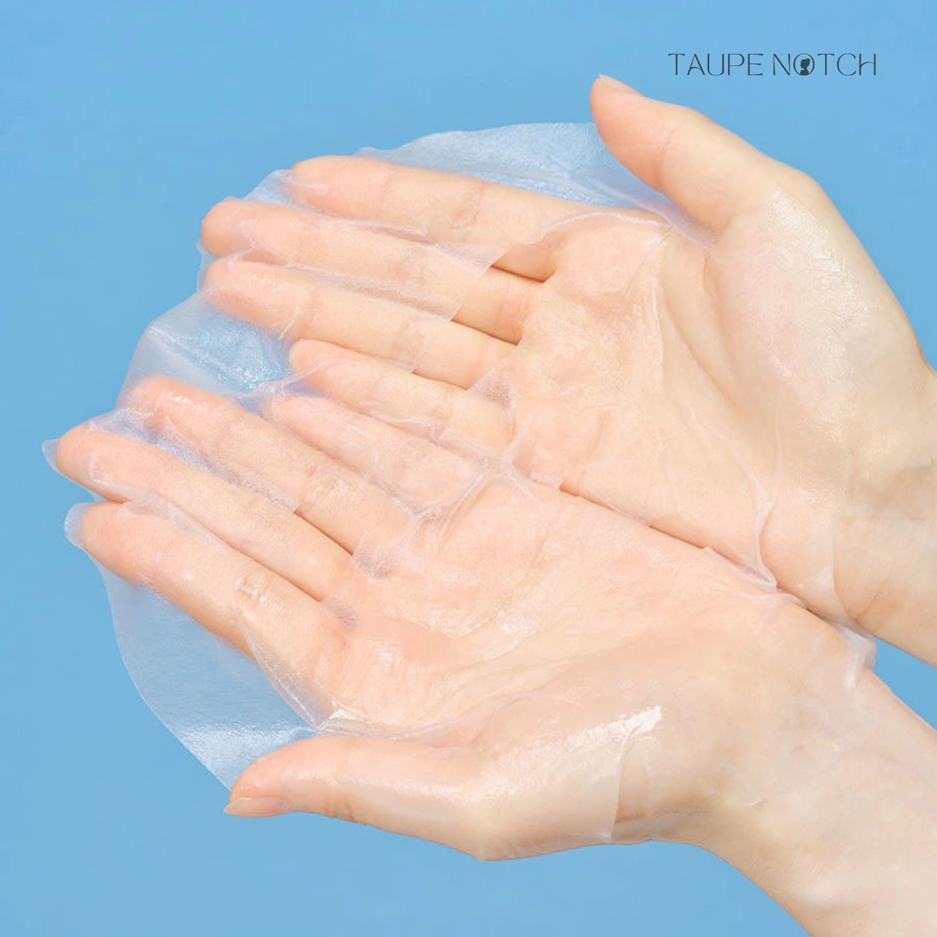 Hydrating water gel sheet mask, translucent blue sheet held between hands