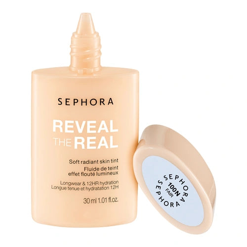 Radiant skin tint bottle front with pump nozzle and shade cap, light beige