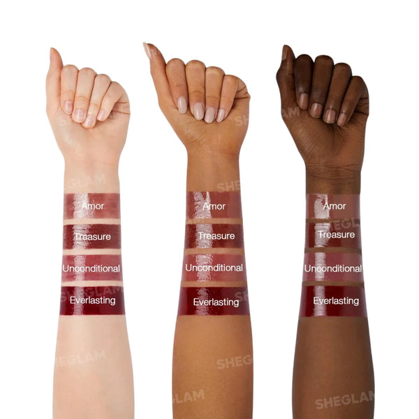 Lip gloss swatches on wrists, rose-brown shimmer with layered streak finish