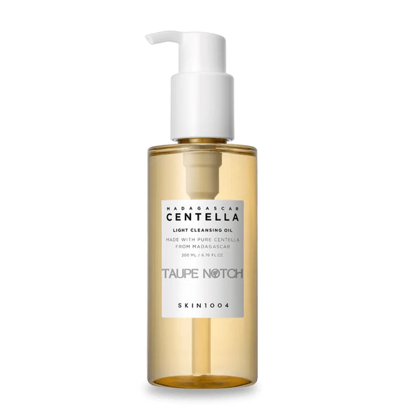 Skin1004 Madagascar centella light cleansing oil bottle with white pump and amber liquid