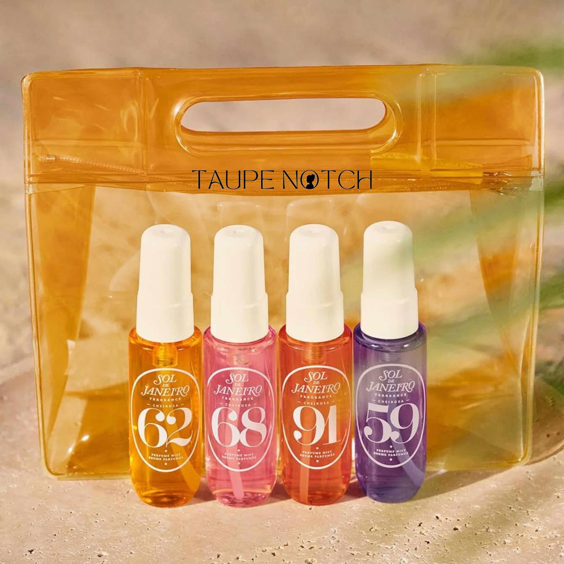 Perfume mist set of four Sol de Janeiro bottles inside a clear amber pouch