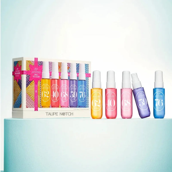 Sol de Janeiro gift set with six mini mist bottles displayed next to the boxed set