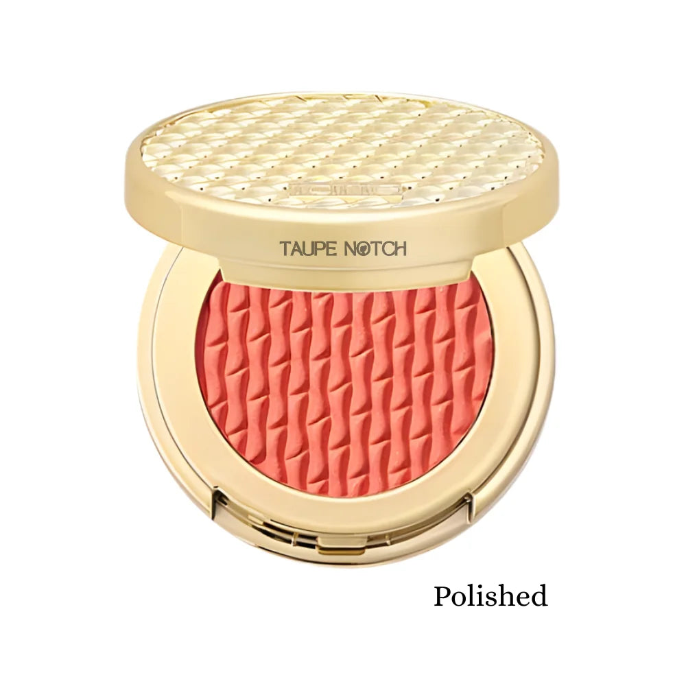 Clay blush compact with coral-pink shade pan and gold lid