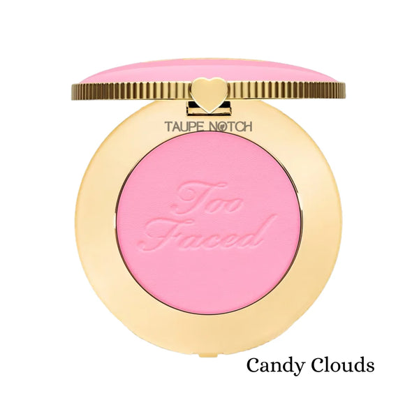 Blush compact with light pink powder, heart clasp, embossed logo—Candy Clouds
