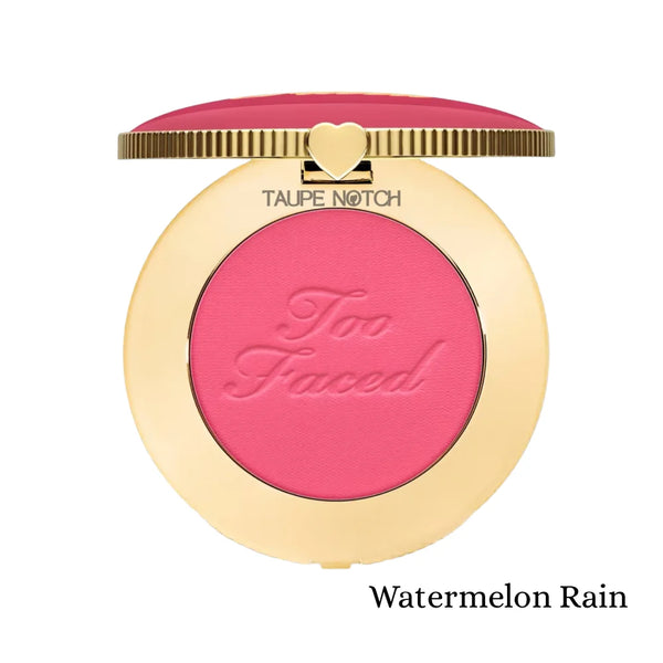 Blush compact with vivid pink powder, heart clasp, embossed logo—Watermelon Rain