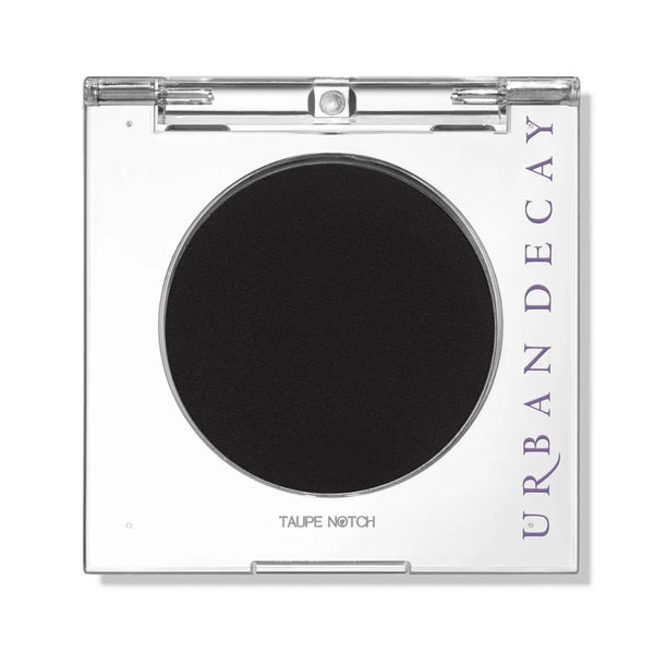 Urban Decay 24/7 longwear eyeshadow pan in black, circular compact with clear lid