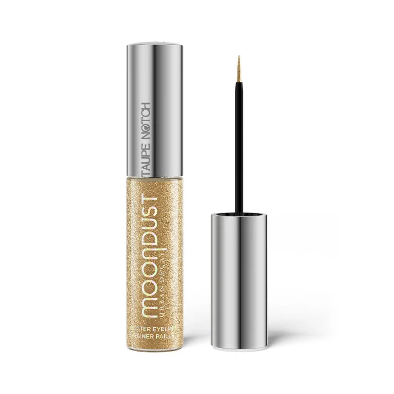 Urban Decay Moondust Glitter Eyeliner open tube in gold glitter shade with fine tip brush applicator​​​​​​​​​​​​​​​​