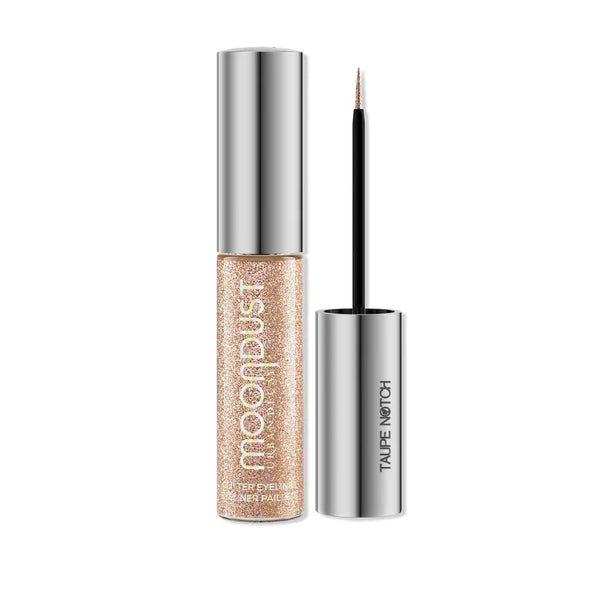 Urban Decay liquid glitter eyeliner, rose-gold Space Cowboy bottle with applicator brush