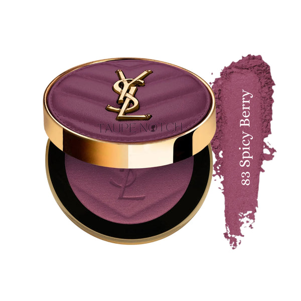 Powder blush compact with berry-magenta powder and gold YSL emblem