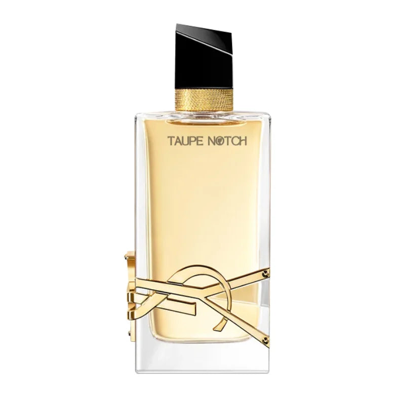 Eau de parfum bottle with black cap, gold trim, and clear glass body