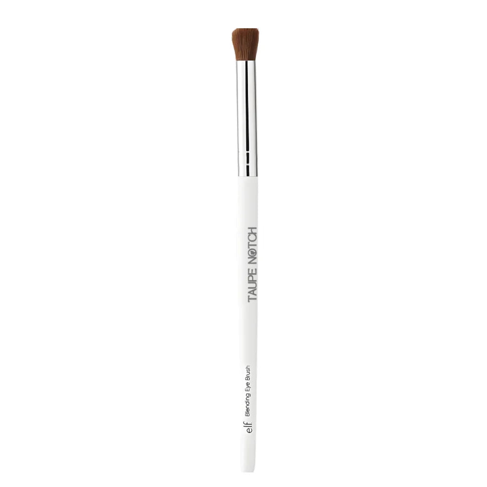 Eye blending makeup brush with tapered brown bristles and white handle